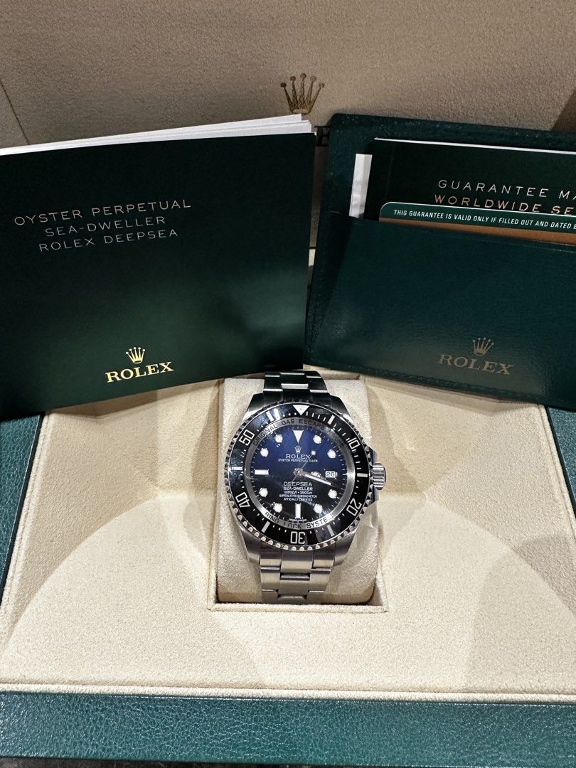 Pre Owned Rolex Oyster Deepsea James Cameron 116660 Blue Dial Automatic Steel Casing Bracelet (Full set) (Category: Watches) located in Singapore. Submitted by shirleyclt (Listing ID 1443860583, Image 1). Description: - Rolex Oyster Perpetual Sea-Dweller Deepsea - Comes with original box and card - Includes guarantee manual - A professional-grade dive watch - Ready for its new owner Model: 116660 Also known as: Oyster Deepsea James Cameron Case s