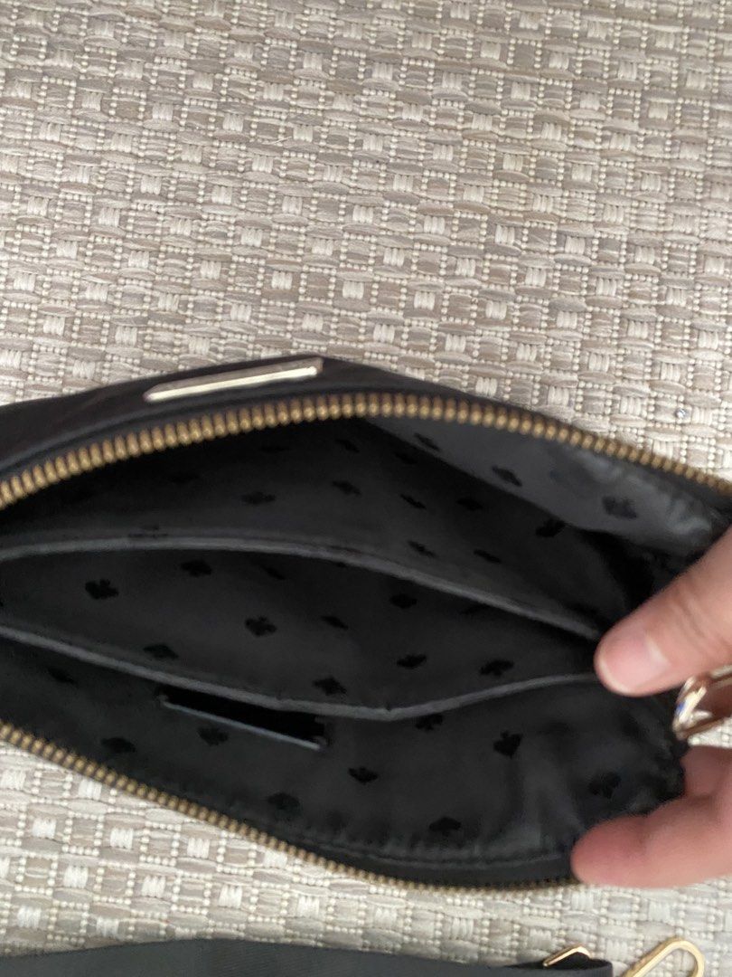 Preloved Auth Kate Spade Nylon Crossbody Bag (Category: Cross-body Bags) located in Makati City. Submitted by golden_gate_bridge (Listing ID 1443724506, Image 3). Description: Preloved Kate’s Spade Crossbody Bag - nylon - double compartments - no tarnishing nor scratches on hardware - wide detachable shoulder strap. Guaranteed authentic. .