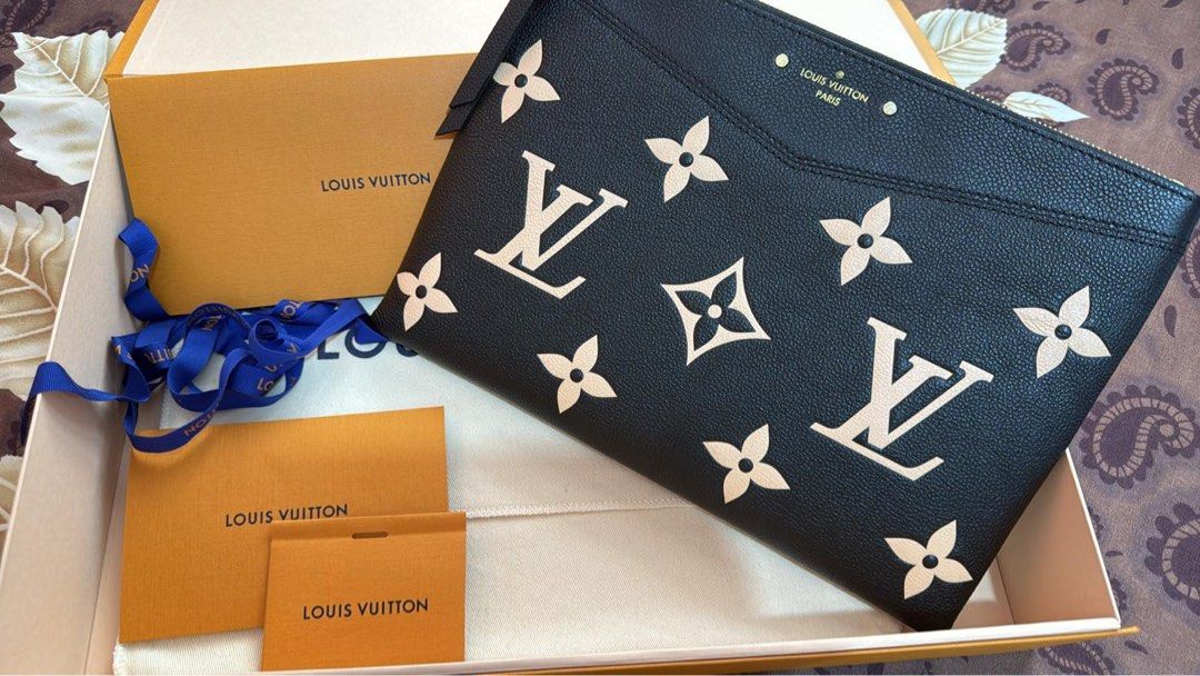 Preloved Daily Pouch m.beige (Category: Luxury Bags & Wallets) located in Manila. Submitted by ayumi017 (Listing ID 1443719678, Image 1). Description: Daily Pouch M.beige LV Clutch Unisex like new no scratch comes with box, paper bag, ribbon, receipt..