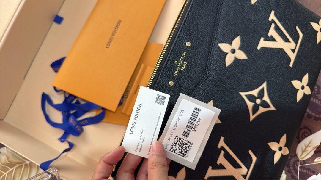 Preloved Daily Pouch m.beige (Category: Luxury Bags & Wallets) located in Manila. Submitted by ayumi017 (Listing ID 1443719678, Image 2). Description: Daily Pouch M.beige LV Clutch Unisex like new no scratch comes with box, paper bag, ribbon, receipt..