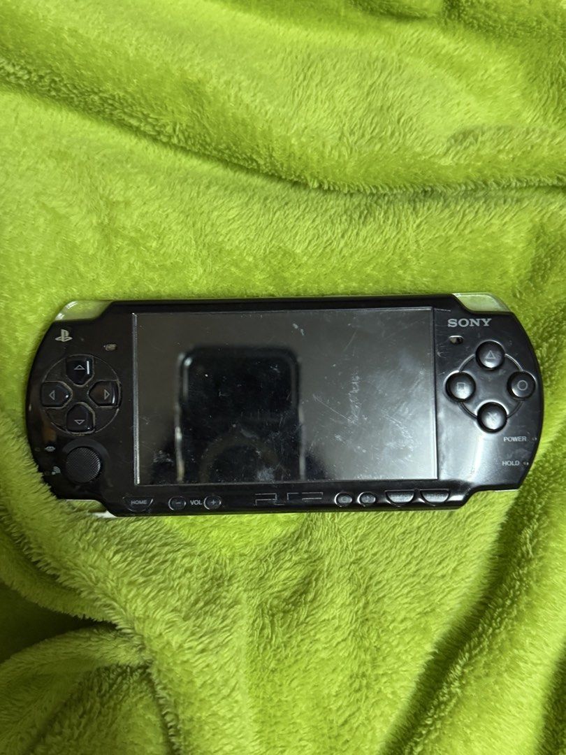 PSP-2000 (Slim & Lite) (Category: PlayStation) located in Pateros City. Submitted by mqg97 (Listing ID 1443711876, Image 1). Description: Condition: Imported from Canada In good working condition; last used 3 months ago New battery from Canada included Charger included Need a battery cover No memory card included RFS: not using it anymore PAY AS YOU ORDER NO COD .