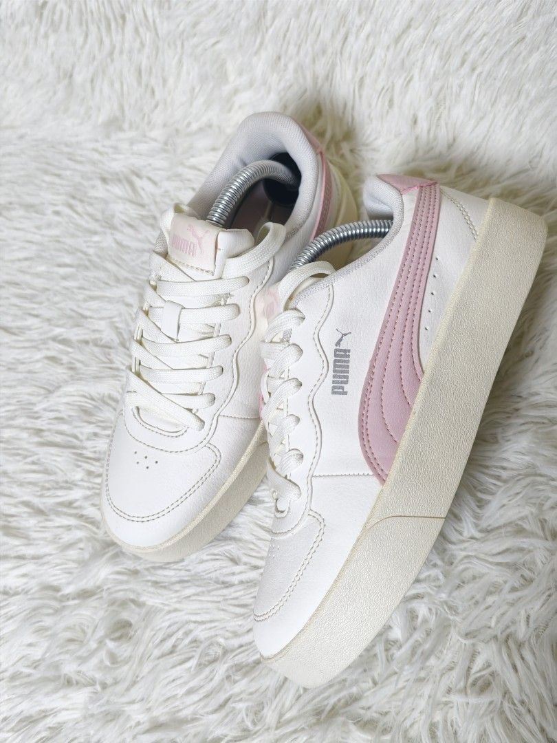 Puma White Pink Platform Sneakers (Category: Sneakers) located in Davao. Submitted by declutterdrop029 (Listing ID 1443808624, Image 2). Description: - White Puma sneakers - Pink accent details - Platform sole for added height - Lace-up closure - Perfect for casual wear - Super comfy and stylish SELLING: PUMA skyle clean shoes PRICE: php 1499 Size: EU 36 CM 22.5 RFS: padala from US. Di nagagamit. I have to many shoes na. Like new condition shippi