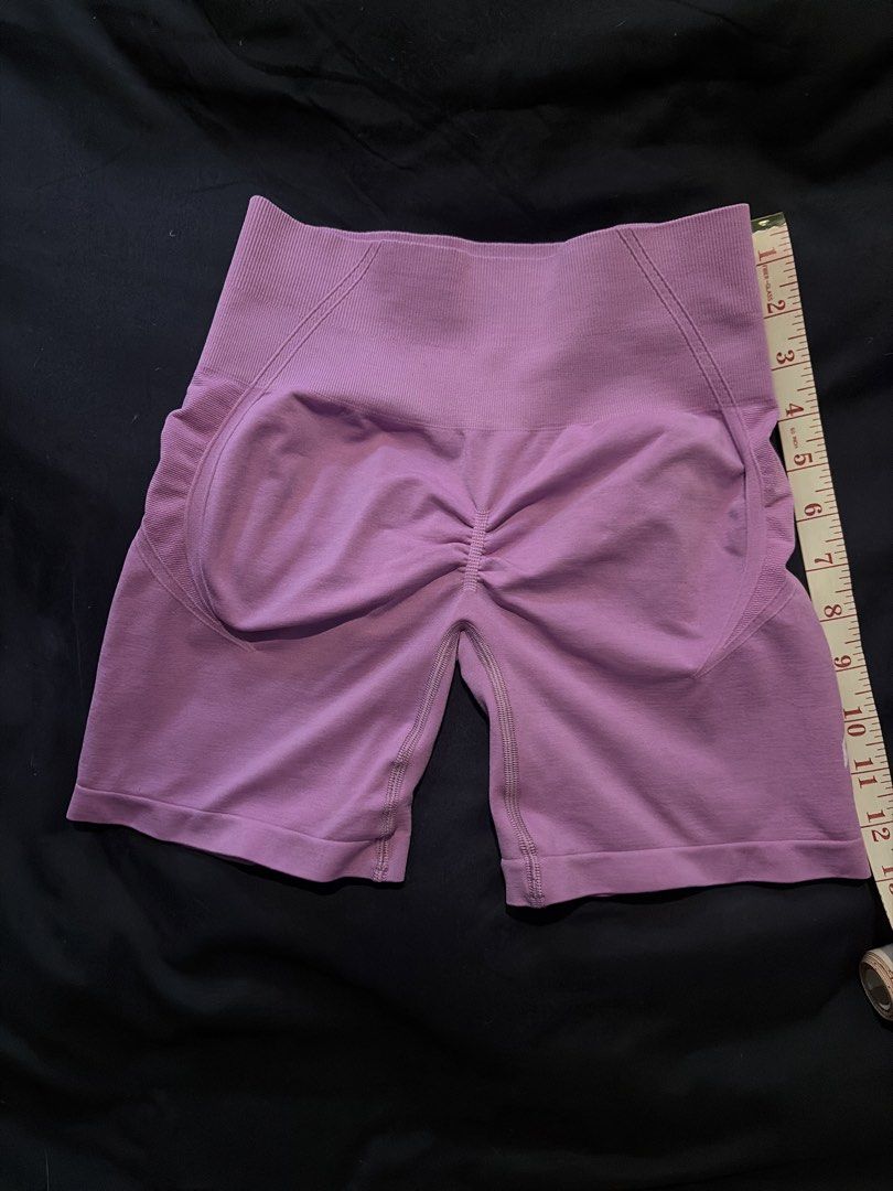 Purple Seamless High Waisted Workout Shorts (Category: Activewear) located in Quezon City. Submitted by shopsoph (Listing ID 1443758944, Image 3). Description: - High-waisted design for a secure and flattering fit. - Lovely shade of purple. - Seamless construction for ultimate comfort. - Ruched detail at the back to enhance your shape. - Stretchy material for freedom of movement. - Ideal for gym workouts, yoga, or casual lounging. - RFS: hand me 
