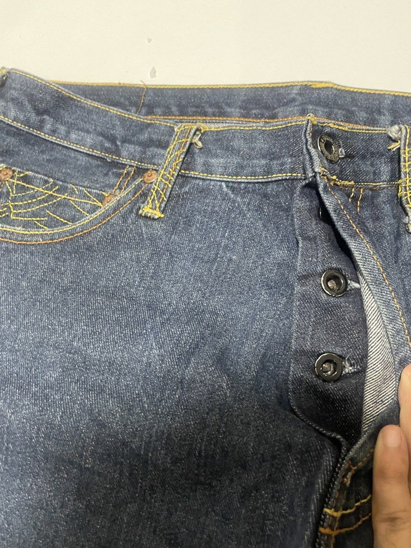 Red Monkey Company Y2K Pants (Category: Jeans) located in Bacoor. Submitted by ury2ksource (Listing ID 1443839766, Image 3). Description: 36 Width - Dark wash denim jeans - Wide leg cut - Unique embroidered patches on back pockets (dragon & mythical creature) - Button fly closure - Distressed hem with frayed edges - Some wear visible on hems.