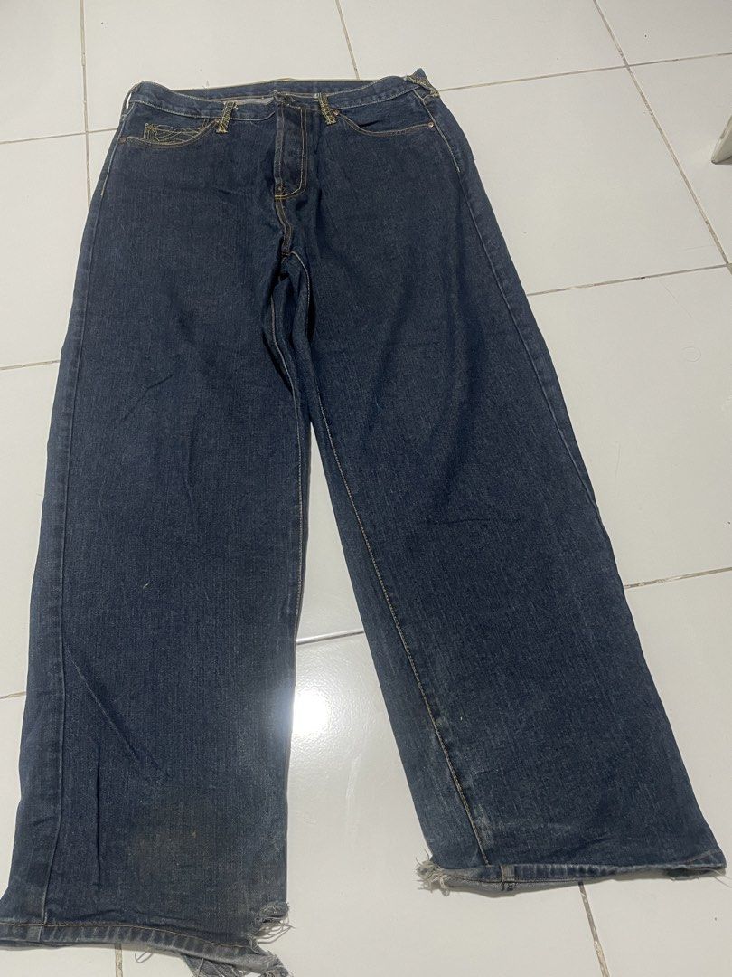 Red Monkey Company Y2K Pants (Category: Jeans) located in Bacoor. Submitted by ury2ksource (Listing ID 1443839766, Image 2). Description: 36 Width - Dark wash denim jeans - Wide leg cut - Unique embroidered patches on back pockets (dragon & mythical creature) - Button fly closure - Distressed hem with frayed edges - Some wear visible on hems.