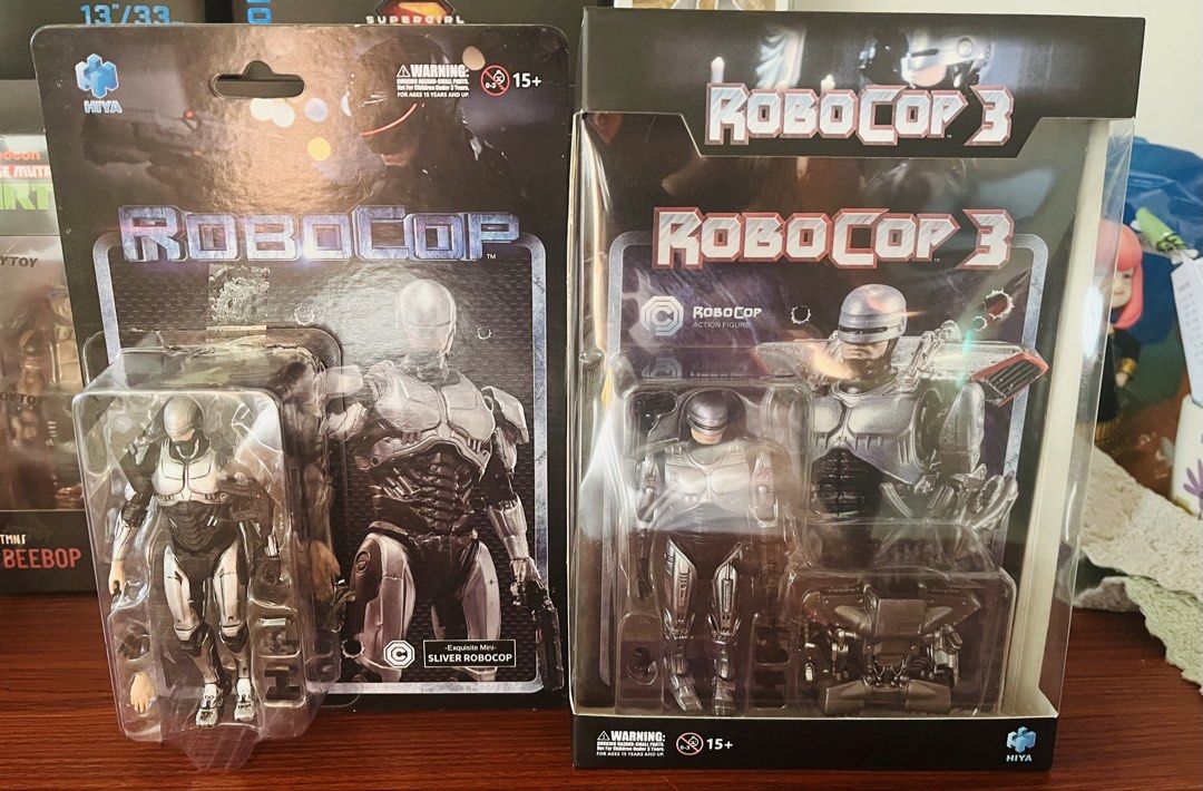 RoboCop 1 & RoboCop 3 Action Figures by MIYA (Category: Figurines & Statues) located in San Pedro. Submitted by btoyzz (Listing ID 1443908274, Image 1). Description: 4k set Robocop- BIB Robocop with jetpack- Sealed 4k pesos set only - Two MIYA action figures: RoboCop and RoboCop 3. - Includes the 'Sliver RoboCop' version. - Both figures are in their original, unopened packaging. - Perfect collectibles for any RoboCop enthusiast..