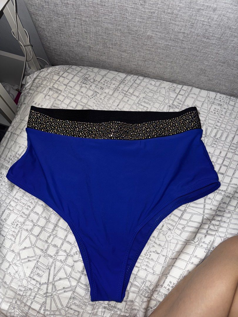 Royal Blue Bikini Set with Rhinestone Band (Category: Bikinis & Swimsuits) located in Manila. Submitted by beaanikasc15079 (Listing ID 1443851568, Image 3). Description: - Royal blue bikini set from The Babe Club - High-waisted bottoms - Structured bikini top - Both pieces feature a black band with rhinestones - Eye-catching and cute design - Ideal for beach or pool days.