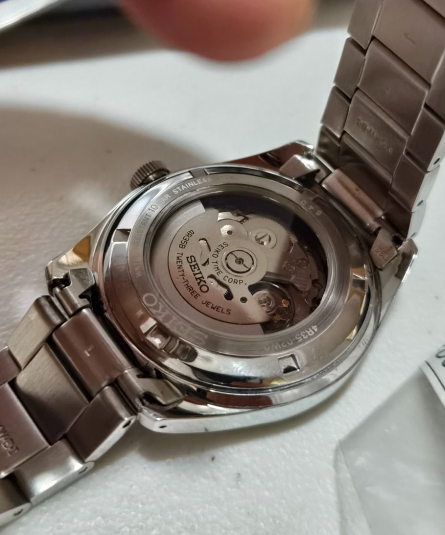 Seiko Watch Neo Sports Automatic (Category: Men's Watches) located in Quezon City. Submitted by jtgabs (Listing ID 1443708469, Image 2). Description: - Seiko Neo Sports Automatic Watch - Model: SRPC85K1 - 4R35B 23 Jewels - Movement: Automatic with manual winding capability - Case: Stainless steel, measuring 42.9mm in diameter and 12.6mm thick. -Features: Displays date and is water resistant up to 10 bar (100 meters). - Classic black dial and mili