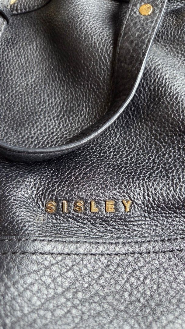 Sisley Black Leather Shoulder Bag (Category: Shoulder Bags) located in San Juan City. Submitted by mjdeclutters (Listing ID 1443799916, Image 2). Description: Brand: Sisley Material: Black Leather Hardware: Gold details Closure: Top zip strap: Adjustable shoulder strap .