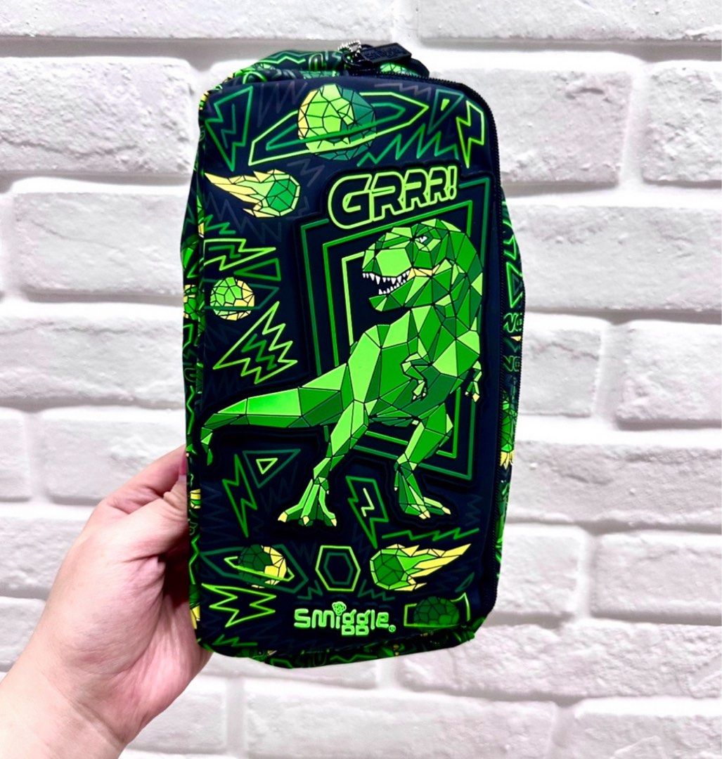Smiggle Dino pencil holder pouch (Category: Babies & Kids Fashion) located in Singapore. Submitted by newleaf24 (Listing ID 1443734826, Image 1). Description: Condition: brand new with tag Original price: $27.95 $3.20 apply for tracked postage.
