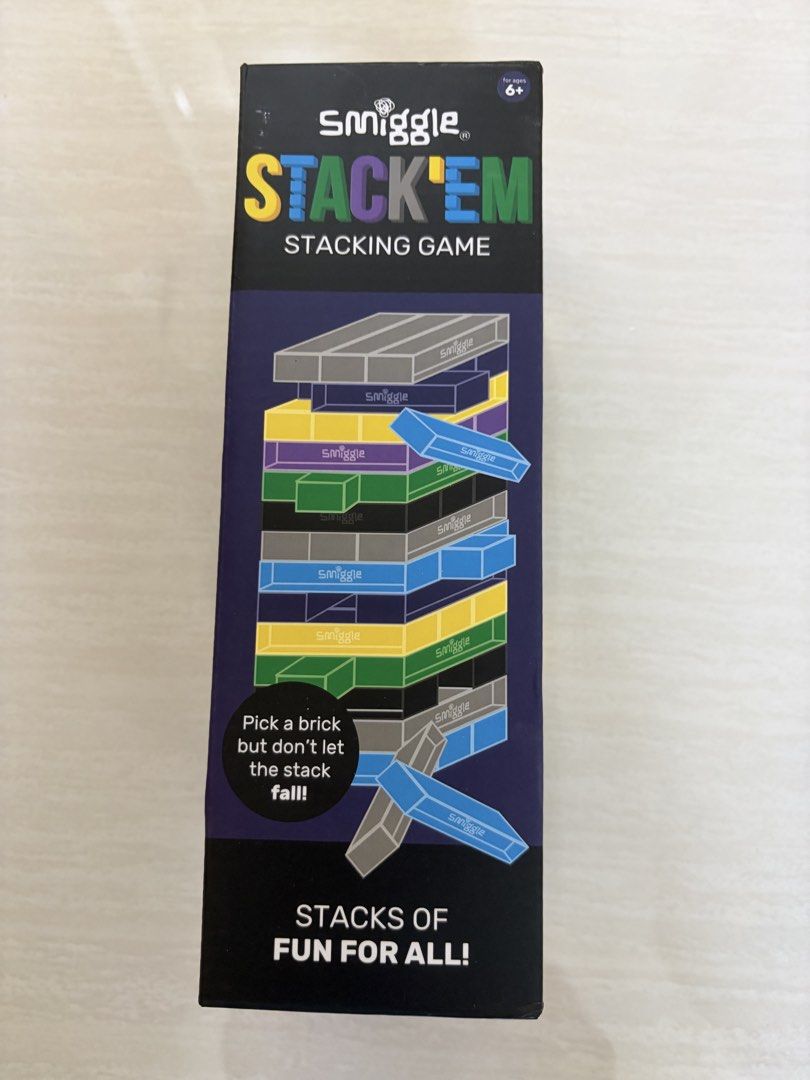 Smiggle Stack 'Em Stacking Game (Category: Board Games & Puzzles) located in Singapore. Submitted by jigglypuff12 (Listing ID 1443737565, Image 1). Description: - Smiggle Stack 'Em stacking game - Pick a brick without toppling the stack! - Hours of fun for everyone - Ideal for family game nights or playing with friends - Suitable for ages 6 and up.