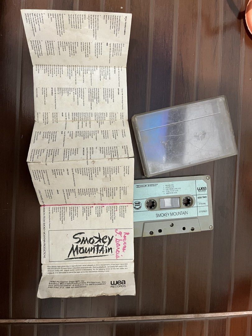 Smokey Mountain Original Cassette Tape (Category: CDs & DVDs) located in Mandaluyong City. Submitted by bwsventures (Listing ID 1443854540, Image 3). Description: • Smokey Mountain cassette tape • Includes original case and lyric insert • Features hit songs: 'Mama', 'Kailan', 'Sabihin Mo' • Perfect for OPM music collectors • Shipping fee to be paid by buyer. .