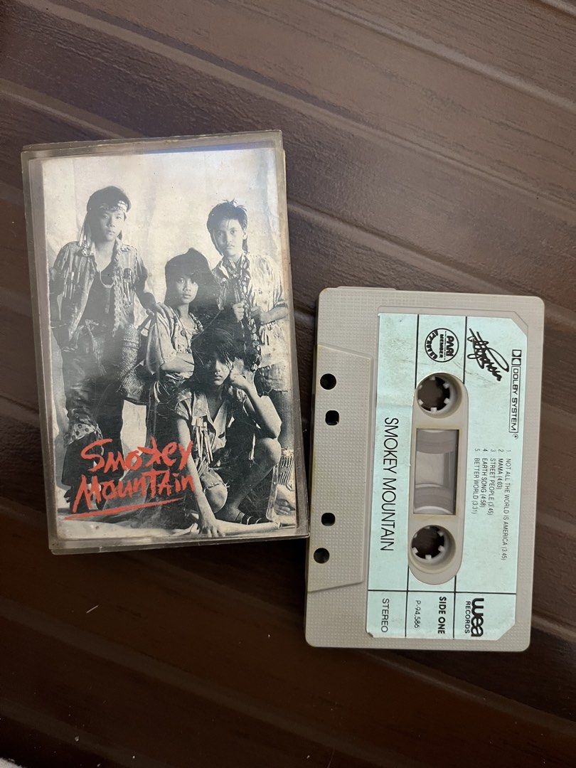Smokey Mountain Original Cassette Tape (Category: CDs & DVDs) located in Mandaluyong City. Submitted by bwsventures (Listing ID 1443854540, Image 1). Description: • Smokey Mountain cassette tape • Includes original case and lyric insert • Features hit songs: 'Mama', 'Kailan', 'Sabihin Mo' • Perfect for OPM music collectors • Shipping fee to be paid by buyer. .