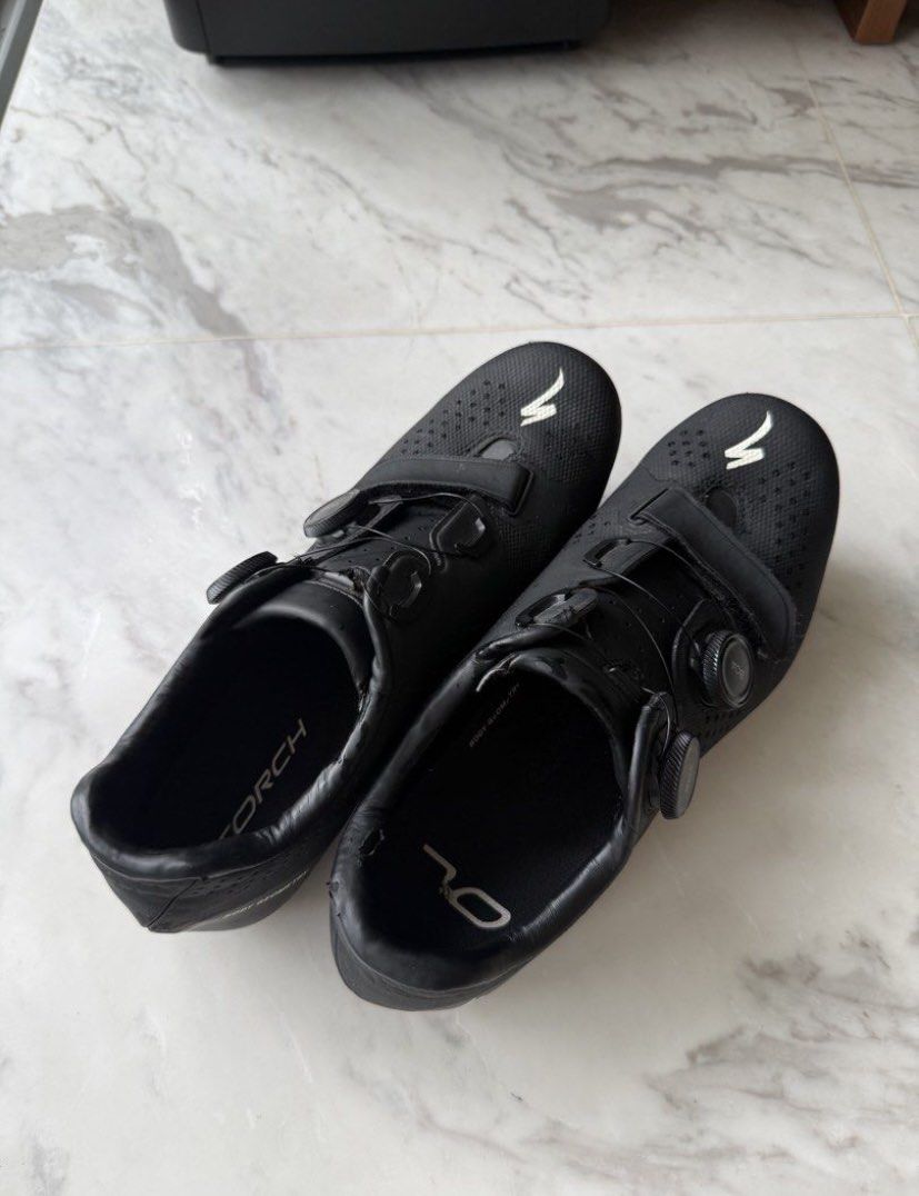 Specialized Torch 3.0 Road Cycling Shoes Eu42 (Category: Parts & Accessories) located in Singapore. Submitted by stahpekwarrior (Listing ID 1443821023, Image 2). Description: - Specialized Torch 3.0 Road Cycling Shoes - Color: Black - Features dual Boa dials for a secure and adjustable fit - Cleats are already attached - Shows minor scuffs on soles and uppers from regular use - Plenty of riding life remaining.
