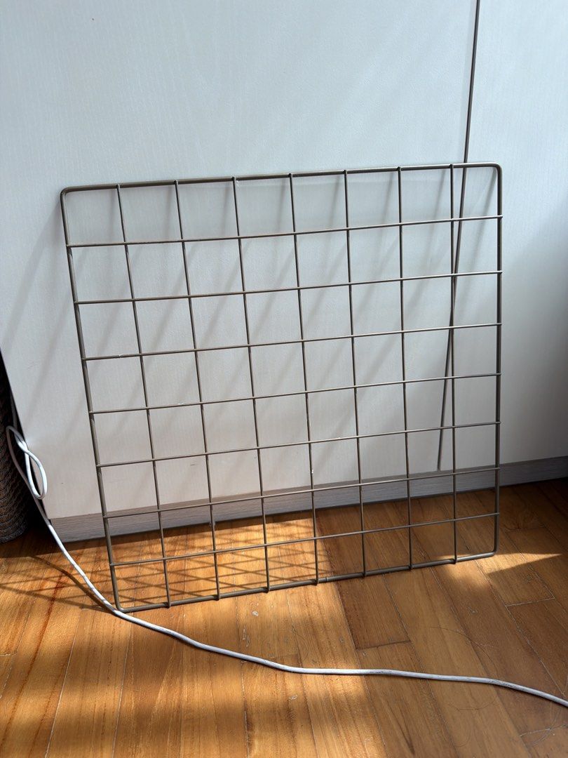 Square Wire Grid Panel (Category: Shelves, Cabinets & Racks) located in Singapore. Submitted by clarissale60003 (Listing ID 1443722421, Image 1). Description: - Square wire grid panel - ~35cm x 35cm - Ideal for displaying photos, notes, or small items - Can be hung on a wall or propped up - Great for home decor and office organization - Easy to clip items onto.
