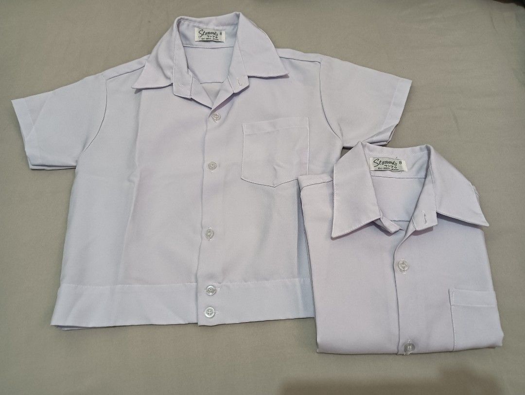 St. Mark's School Uniform Shirts - Size 8 (2 pcs) (Category: Tshirts & Polo Shirts ) located in Mandaluyong City. Submitted by ehrgeee (Listing ID 1443772154, Image 1). Description: - Set of 2 St. Mark's school uniform shirts - Size: 8 - Color: White - No stains. Good as new. - Suitable for ages 3-5 years old - Montessori Casa (Kinder 1-3) - Style: Short sleeves, button-up front - Features: Chest pocket - Condition: Great for school days.
