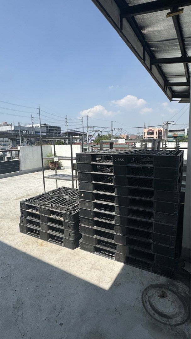 Stackable Black Plastic Pallets (Category: Construction & Building Materials) located in Quezon City. Submitted by itsyvrae (Listing ID 1443793111, Image 1). Description: - Stackable black plastic pallets - Durable and ideal for warehouse or shipping - Shows some signs of wear, but fully functional - Available for pickup - Message for questions.