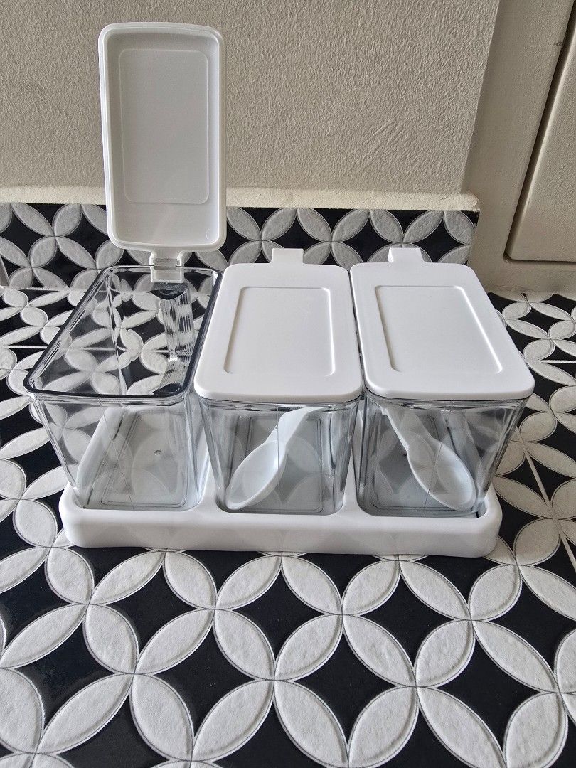 Stackable Spice Rack (Category: Food Organisation & Storage) located in Singapore. Submitted by poohroyal (Listing ID 1443748544, Image 1). Description: - Stackable spice rack - Ideal for kitchen spice organization - Provides easy access to seasonings - Creates a neat and tidy look.