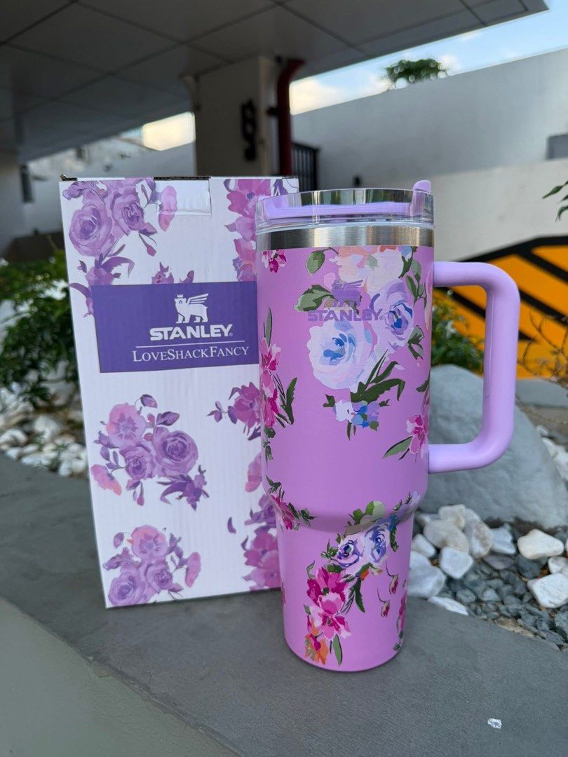 Stanley x LoveShackFancy Tumbler with Handle (Category: Water Bottles & Tumblers) located in Manila. Submitted by bautistasa98034 (Listing ID 1443905881, Image 3). Description: - Authentic Stanley x LoveShackFancy collaboration tumblers. - Available in multiple charming floral designs and colors: white with pink roses, pink with bows and roses, purple floral, and blue floral. - Each tumbler includes its original packaging. - Perfect for maintaini