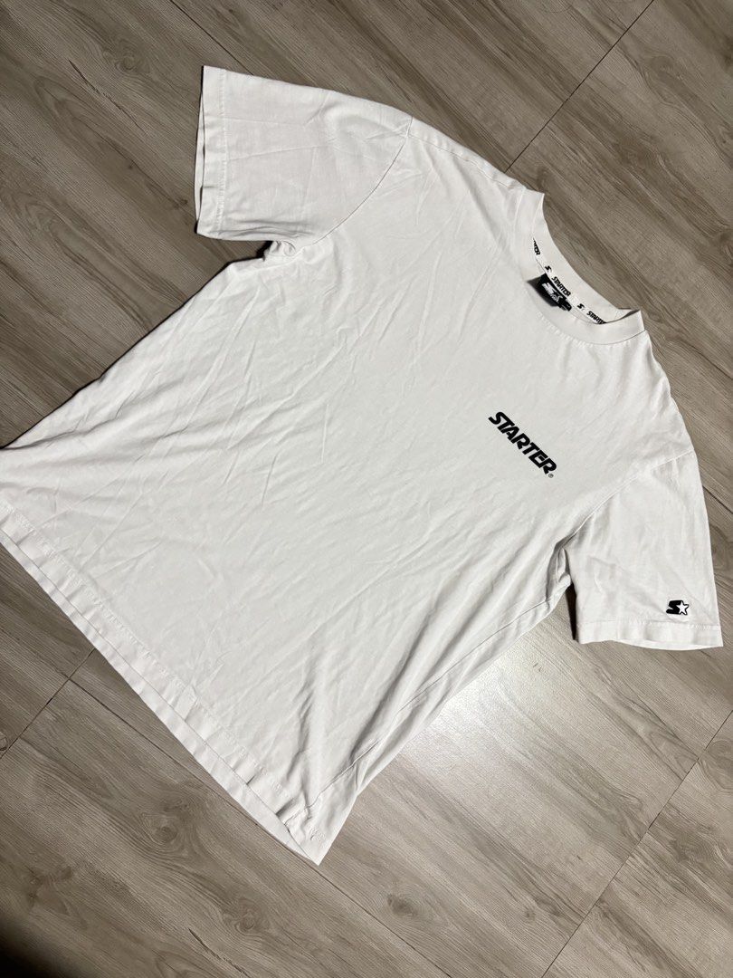 Starter White T-Shirt with Logo (Category: Tshirts & Polo Shirts ) located in Cavite. Submitted by cesxyyylll (Listing ID 1443823437, Image 1). Description: - Classic white Starter t-shirt - Features printed Starter logo on the chest - Smaller Starter logo detail on the sleeve - Comfortable and casual design - Ideal for everyday wear - Easily pairs with jeans or shorts.