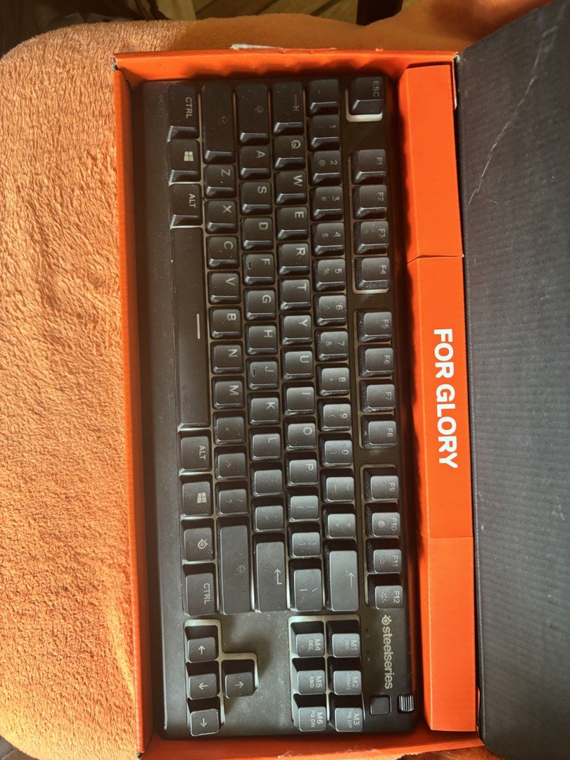SteelSeries Apex 3 TKL RGB Gaming Keyboard (Category: Computer Keyboard) located in Cainta. Submitted by jakywithe (Listing ID 1443751701, Image 3). Description: - SteelSeries Apex 3 TKL Gaming Keyboard - Compact TKL (Tenkeyless) design for more desk space - Vibrant RGB illumination - IP32 water resistant for spill protection - Perfect for gaming and everyday use - Includes original box - Tested and confirmed to be in excellent working condition 