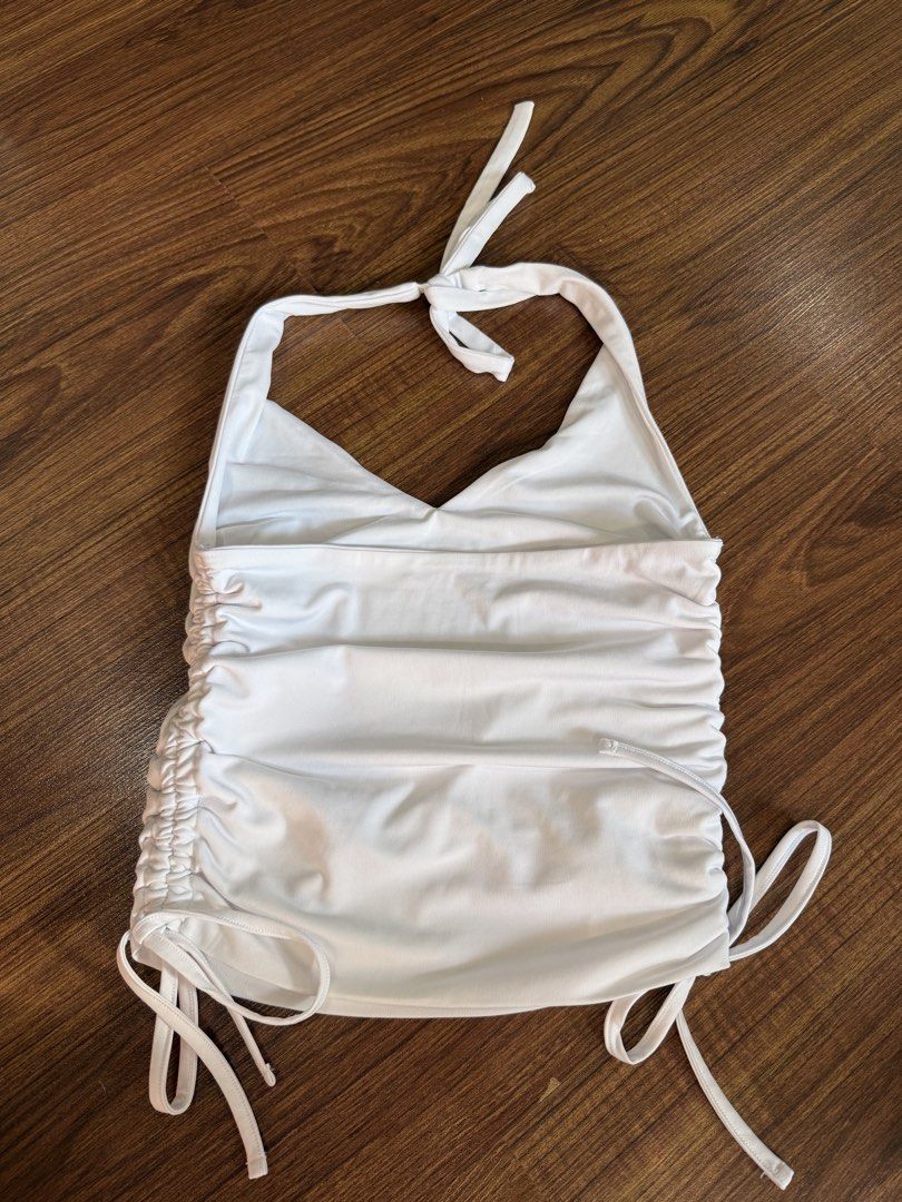 Supre White Ruched Halter Top XS (Category: Sleeveless) located in Quezon City. Submitted by closetcute (Listing ID 1443815999, Image 2). Description: Ruched sides with adjustable drawstring ties Ties at the neck for a customizable fit .