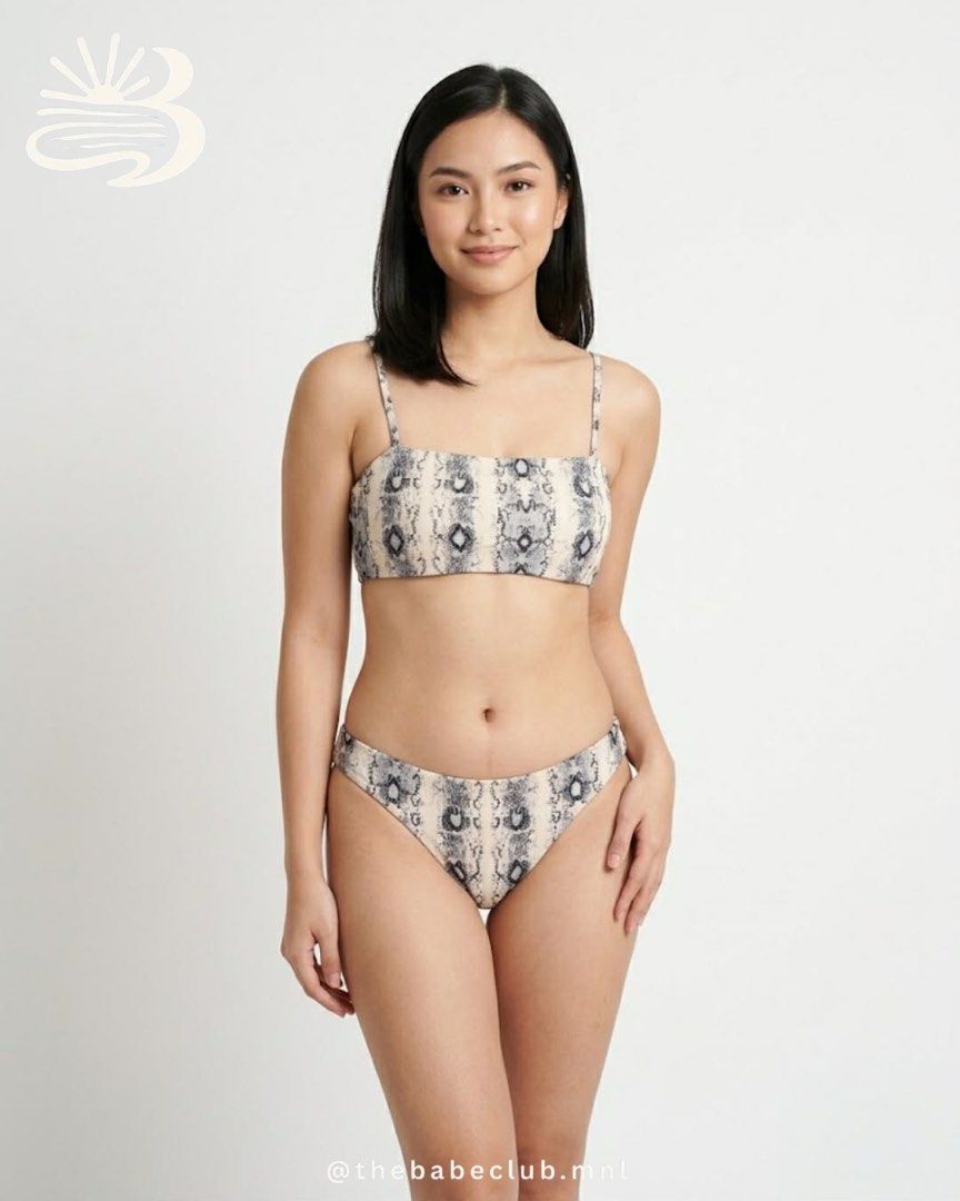 The Babe Club Bikini Set - Snake Print (Category: Bikinis & Swimsuits) located in Manila. Submitted by beaanikasc15079 (Listing ID 1443852812, Image 2). Description: - Cute snake print bikini set - Brand: The Babe Club - Style: Bandeau top with adjustable straps - Matching bikini bottoms - Ideal for beach trips or pool days - Comfortable and stylish design.