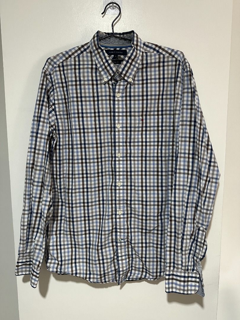 Tommy Hilfiger Checkered Button Down Shirt (Category: Formal Shirts) located in Balagtas. Submitted by bookplug_ph (Listing ID 1443787209, Image 2). Description: Length: 29 inches Width: 22 inches.