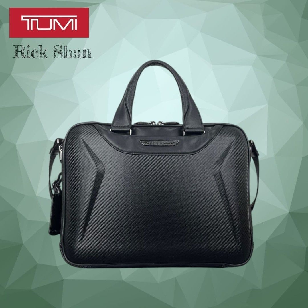 TUMI McLaren Axle Slim Brief features CX6 (Category: Briefcases) located in Manila. Submitted by r1ckshan (Listing ID 1443716896, Image 1). Description: TUMI briefcase in black. Features a carbon fiber textured exterior. Has top handles and a detachable shoulder strap. Multiple compartments for organization. Great for work or travel. Check photos for details. Price: 12,500 Location: Laguna Binan MOP: GCASH & MAYA SHIPPING: LALAMOVE, LBC.
