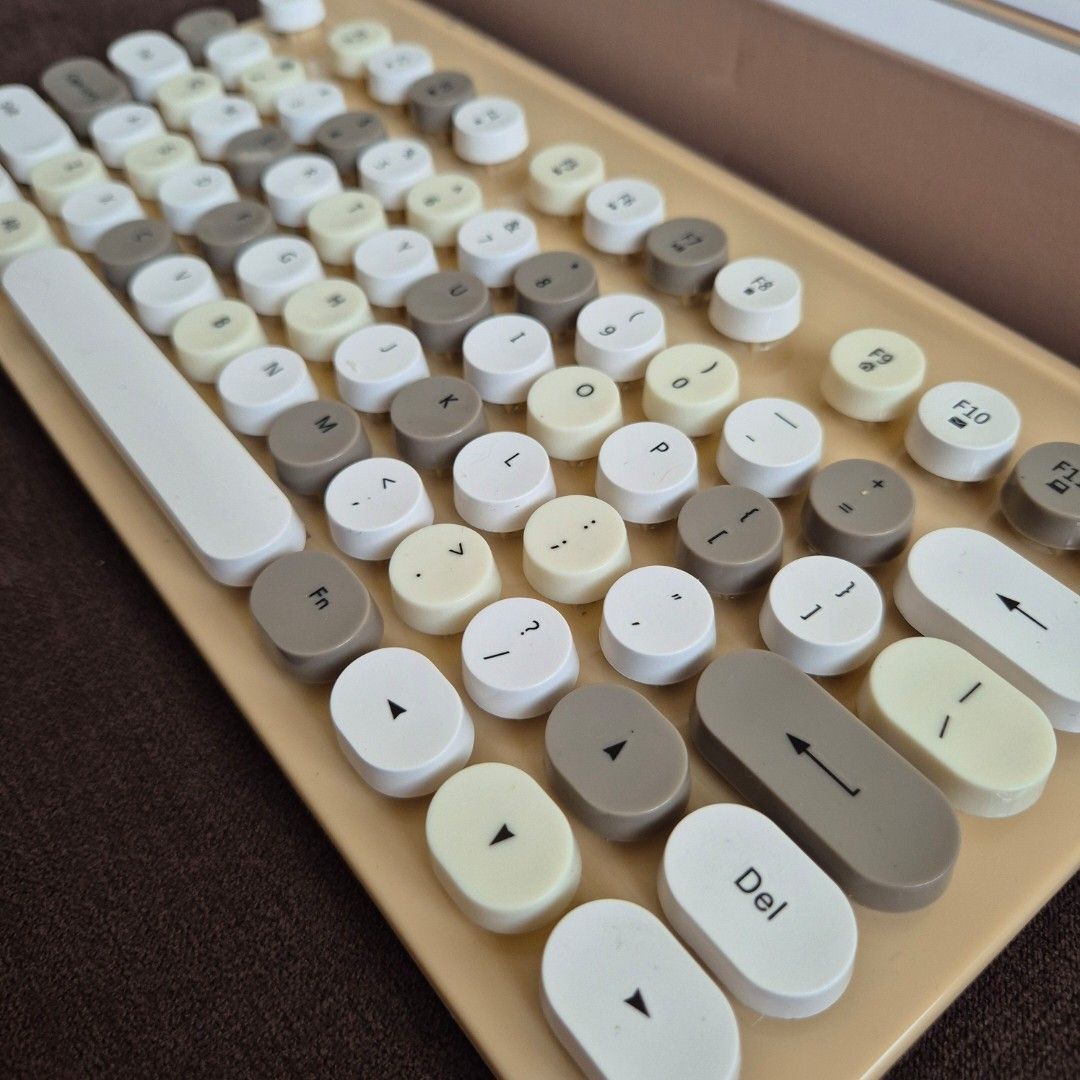 Typo Writer Wireless Keyboard retro vintage (Category: Computer Keyboard) located in Makati City. Submitted by nkris07 (Listing ID 1440636272, Image 3). Description: (Preloved) TYPO Retro wireless keyboard As is condition, super nice, no damage🤎 Vintage typewriter-style round keycaps Beige and cream color scheme USB Wireless connectivity Original box included.