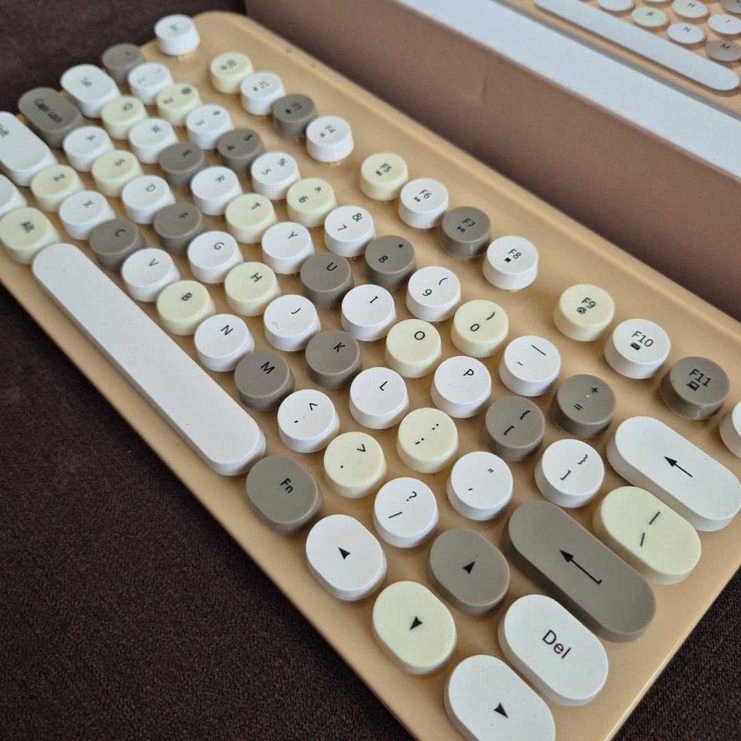 Typo Writer Wireless Keyboard retro vintage (Category: Computer Keyboard) located in Makati City. Submitted by nkris07 (Listing ID 1440636272, Image 2). Description: (Preloved) TYPO Retro wireless keyboard As is condition, super nice, no damage🤎 Vintage typewriter-style round keycaps Beige and cream color scheme USB Wireless connectivity Original box included.