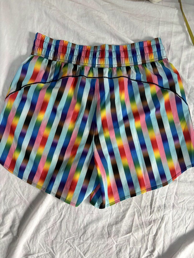 Under Armour Flex Woven 5inch Pride Shorts M/M #pridemonth (Category: Shorts) located in Taguig. Submitted by amiwear (Listing ID 1443883121, Image 2). Description: - Brand: Under Armour - Style: Rainbow striped athletic shorts - Size: Medium (M) - Features: Elastic waistband with drawstring, side pockets - Ideal for: Running, workouts - Design: Vibrant and eye-catching print - Origin: Made in the Philippines RFS: Declutterring MOP: BPI/UB Condit