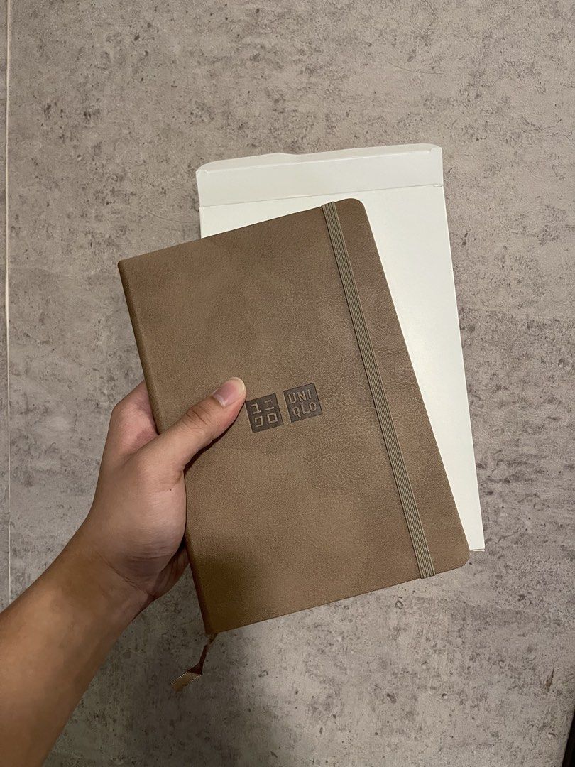 Uniqlo 2026-2027 Brown Planner (Category: Stationery & School Supplies) located in Quezon City. Submitted by nikes.closetfinds (Listing ID 1443714272, Image 1). Description: Selling my Uniqlo Brown Planner for ₱500! - Brand new - Ideal for notes and journaling - Classic and simple design 📍 Meet-up: Commonwealth/Katipunan Area 🚚 Shipping available via Lalamove or Grab (buyer pays) 💳 GCash / Maya / Bank transfer rfs: need funds Slightly Negotiab