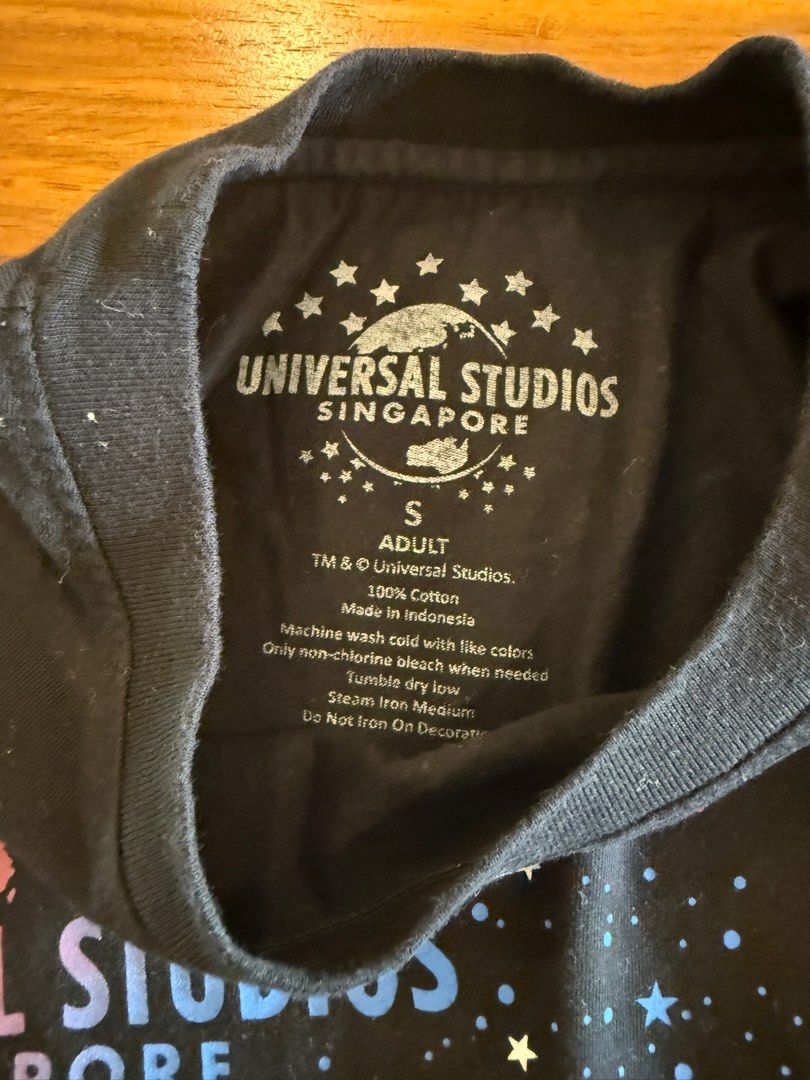 Universal Studios Singapore Astronaut Black Graphic Tee (Category: Shirts) located in Bacolod City. Submitted by formicary (Listing ID 1443886616, Image 3). Description: Black T-Shirt from Universal Studios Singapore, features a cool astronaut graphic in space - 100% Cotton, fits small to medium. 🌿 Condition: Great! Worn once or twice 🛒 RFS: Decluttering! 💸 MOP: GCash or BPI [Seller is in Bacolod, buyer will shoulder the shipping fee.] .