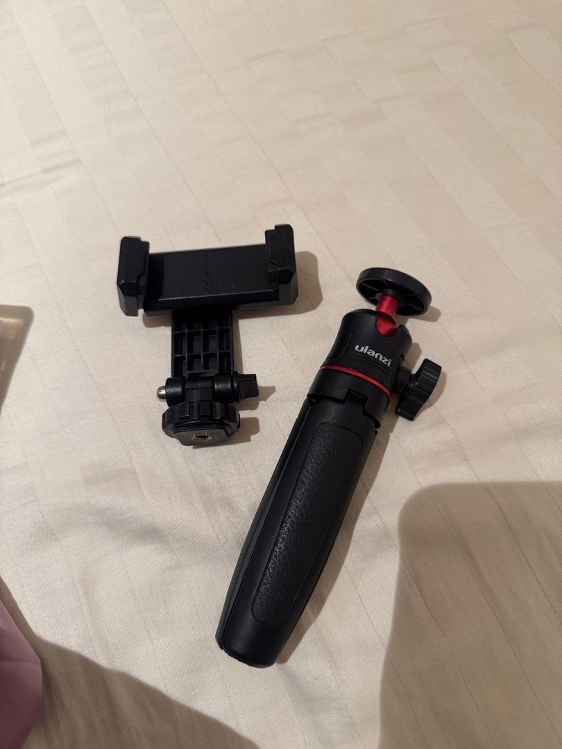Upanzi Mini Tripod (Category: Tripods & Monopods) located in Quezon City. Submitted by declutterwithcc (Listing ID 1443718441, Image 3). Description: Selling as Bundle for ₱500 only. I bought this separately around ₱550-₱650 per part. Please note that ULANZI brand is quite expensive because they are known. • Phone clip is broken BUT its still usable, you can still clip your phone • tripod in MINT condition .