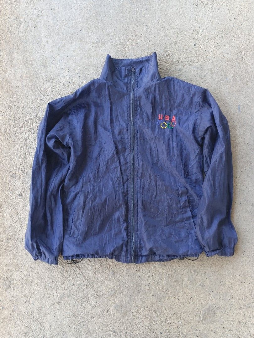 USA Olympic Track Jacket (Category: Coats, Jackets and Outerwear) located in Manila. Submitted by maverick_so.litt3 (Listing ID 1443736798, Image 1). Description: - Blue track jacket with USA Olympic rings logo - Full zip front closure - Stand-up collar design - Elasticated cuffs and hem for a snug fit - Ideal for casual wear or athletic activities.
