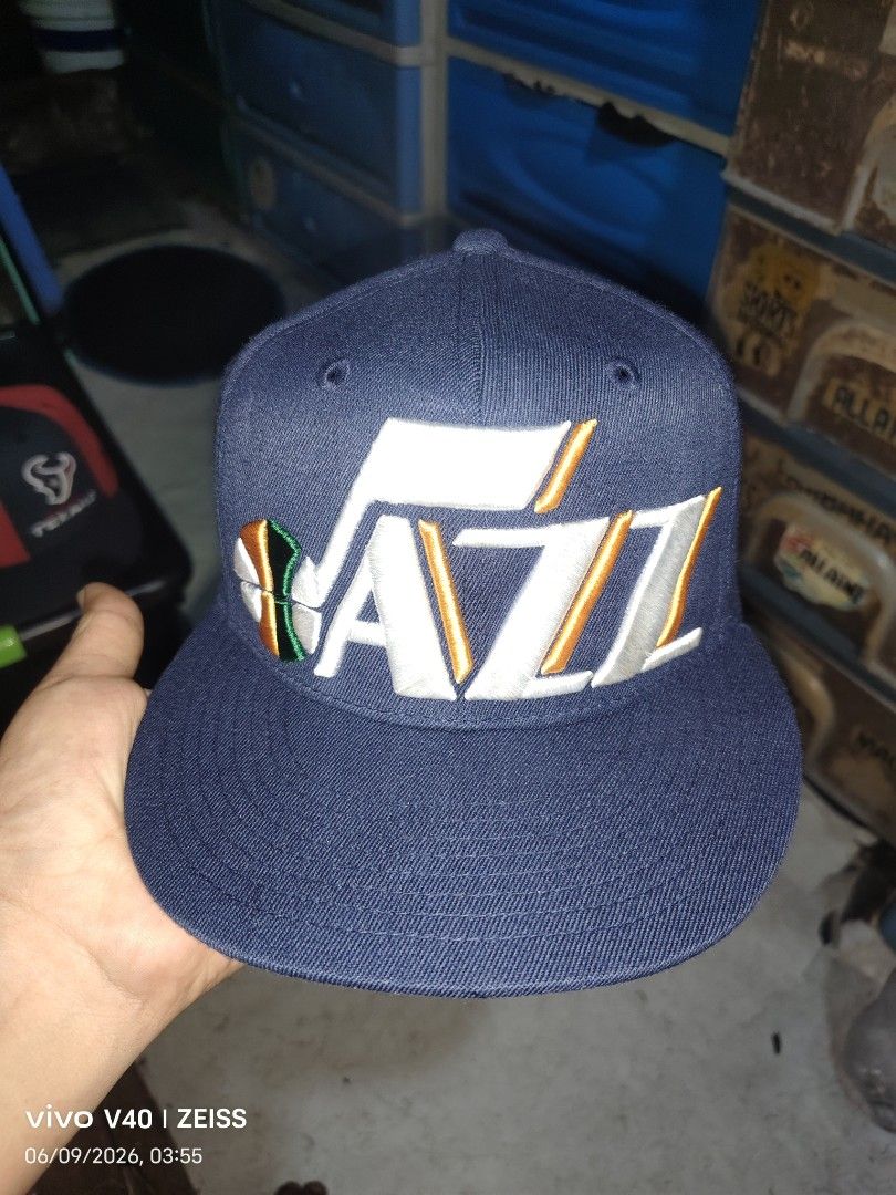 Vintage Adidas Utah Jazz Fitted Cap (Category: Caps & Hats) located in Makati City. Submitted by fajardosisters (Listing ID 1443896567, Image 1). Description: - Navy blue snapback cap - Features the iconic Utah Jazz logo on the front - Adidas trefoil logo on the back - Contrasting yellow brim underside - Adjustable snapback closure for a perfect fit - Ideal for any dedicated Utah Jazz fan! 📌WOOL FABRIC📌.