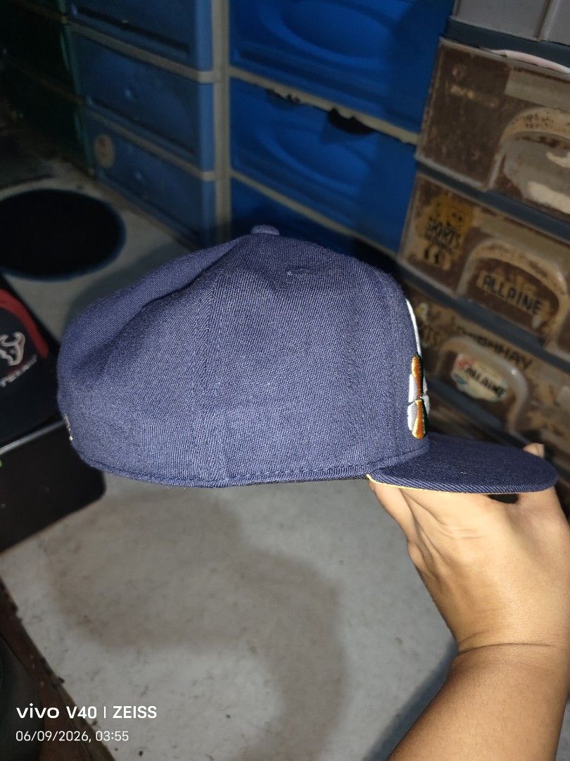 Vintage Adidas Utah Jazz Fitted Cap (Category: Caps & Hats) located in Makati City. Submitted by fajardosisters (Listing ID 1443896567, Image 3). Description: - Navy blue snapback cap - Features the iconic Utah Jazz logo on the front - Adidas trefoil logo on the back - Contrasting yellow brim underside - Adjustable snapback closure for a perfect fit - Ideal for any dedicated Utah Jazz fan! 📌WOOL FABRIC📌.