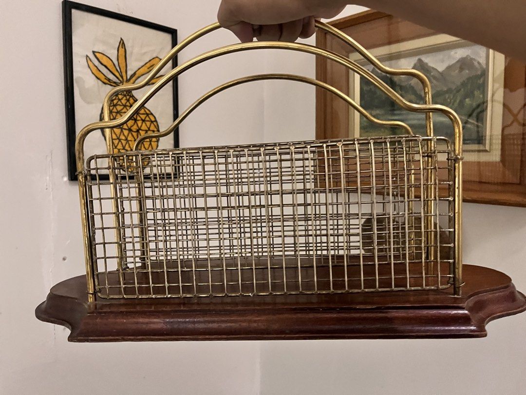 Vintage Brass Magazine / Vinyl Rack (Category: Other Home Decor) located in Taguig. Submitted by frank63studio (Listing ID 1443703362, Image 2). Description: Vintage Brass Magazine / Vinyl Rack 2,250php newly polished wood base condition : 7/10 flaws: 1 strip wood edge chipped and minimal dents but overall in good condition (last pic attached ).