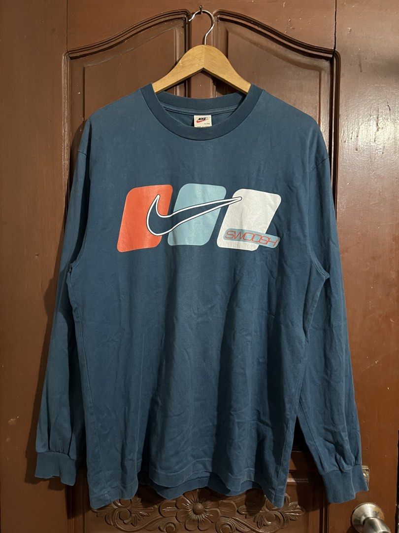 Vintage Nike Blue Crewneck (Category: Coats, Jackets and Outerwear) located in Manila. Submitted by thriftpoint99 (Listing ID 1443895657, Image 1). Description: 22.5x30 Issue hairline print Excellent condition.