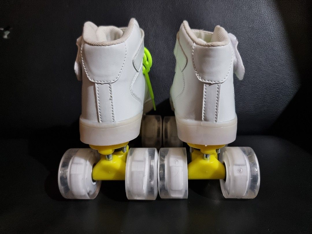 Sneaker Quad Roller Skates Kids (Category: Skates, Rollerblades & Scooters) located in Imus. Submitted by aim_for_less (Listing ID 1443867884, Image 3). Description: White high-top sneaker-style Quad Roller Skates Kids - SIZE: 20CM (See last pic) - Bright neon green laces - Clear wheels with yellow accents - Ideal for cruising and having fun - Equipped with rechargeable battery-free kinetic LED flashing - Charge via micro usb - Excellent Conditio