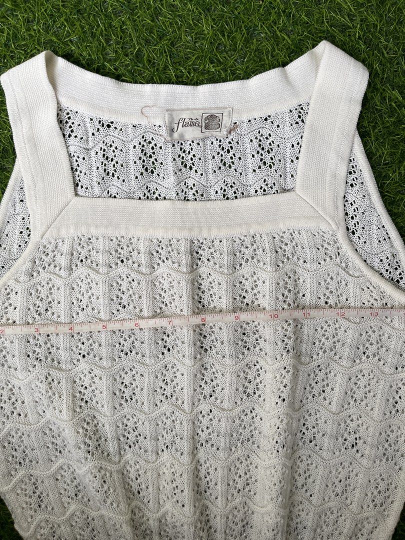 White Lace Knit Sleeveless Top (Category: Sleeveless) located in Bacolod City. Submitted by marbiii (Listing ID 1443782181, Image 1). Description: - White sleeveless knit top - Pretty lace pattern - Square neckline - Ribbed hem - Approx. 15 inches across the chest - Great for layering or wearing alone - Perfect for casual or dressy occasions.