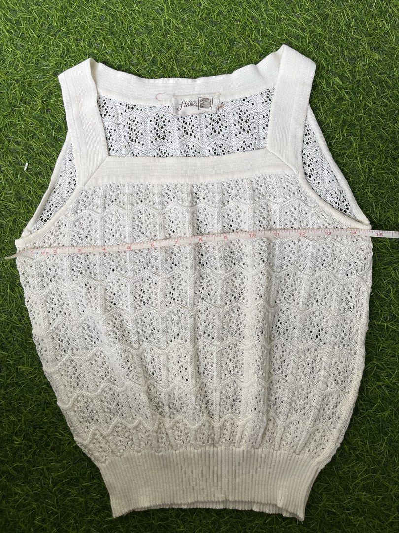 White Lace Knit Sleeveless Top (Category: Sleeveless) located in Bacolod City. Submitted by marbiii (Listing ID 1443782181, Image 2). Description: - White sleeveless knit top - Pretty lace pattern - Square neckline - Ribbed hem - Approx. 15 inches across the chest - Great for layering or wearing alone - Perfect for casual or dressy occasions.