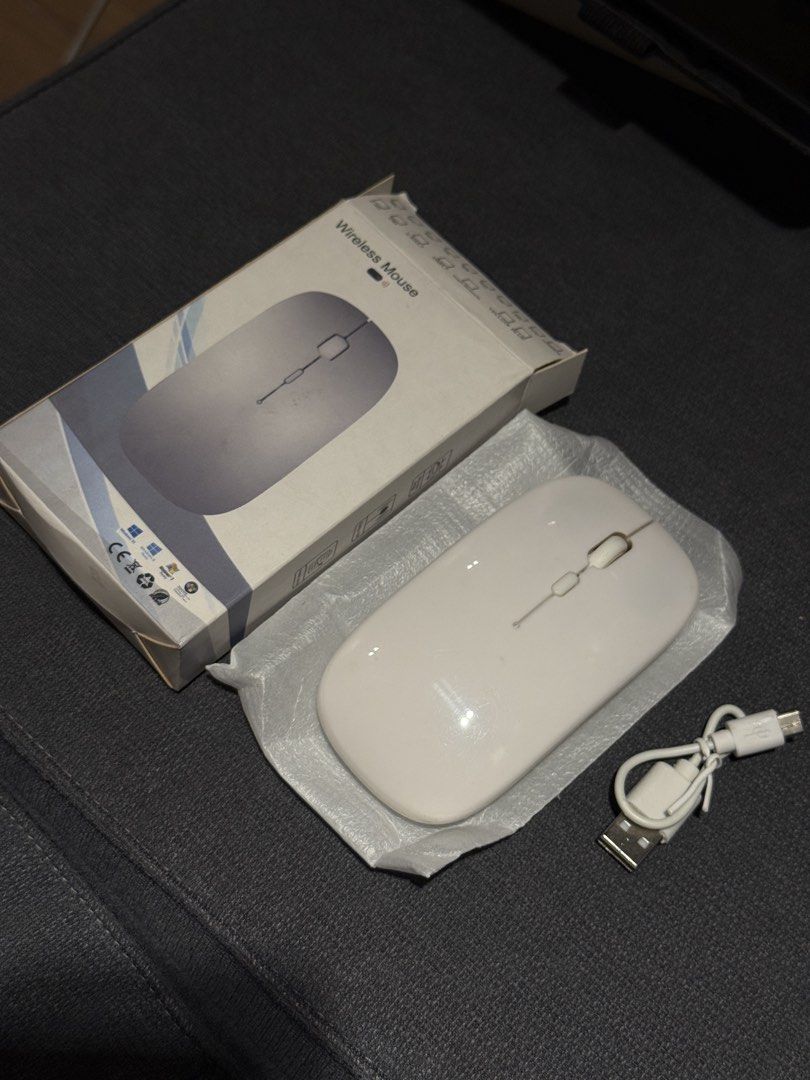Wireless Mouse Bluetooth Mouse 2.4GHz Rechargeable Wireless (Category: Mouse & Mousepads) located in Makati City. Submitted by preheartedgoods (Listing ID 1443887705, Image 1). Description: Used less than 5x May mark sa side - refer to photos nlng No internal issue RFS: Decluttering Location: Makati Pickup/Delivery/Courier.