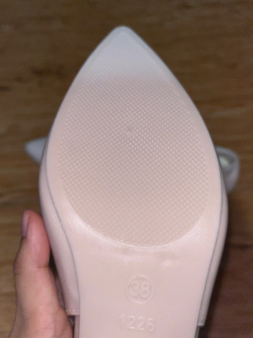 Women's Pointed Toe Slingback Heels (Category: Heels) located in Manila. Submitted by declutter0_0 (Listing ID 1443809096, Image 3). Description: - Light pink pointed toe slingback heels - Size 38 (avail also 36 used once same color) - Low block heel for comfortable wear - Stylish clear strap detail - Textured sole for enhanced grip - Versatile: great for dressing up or down.