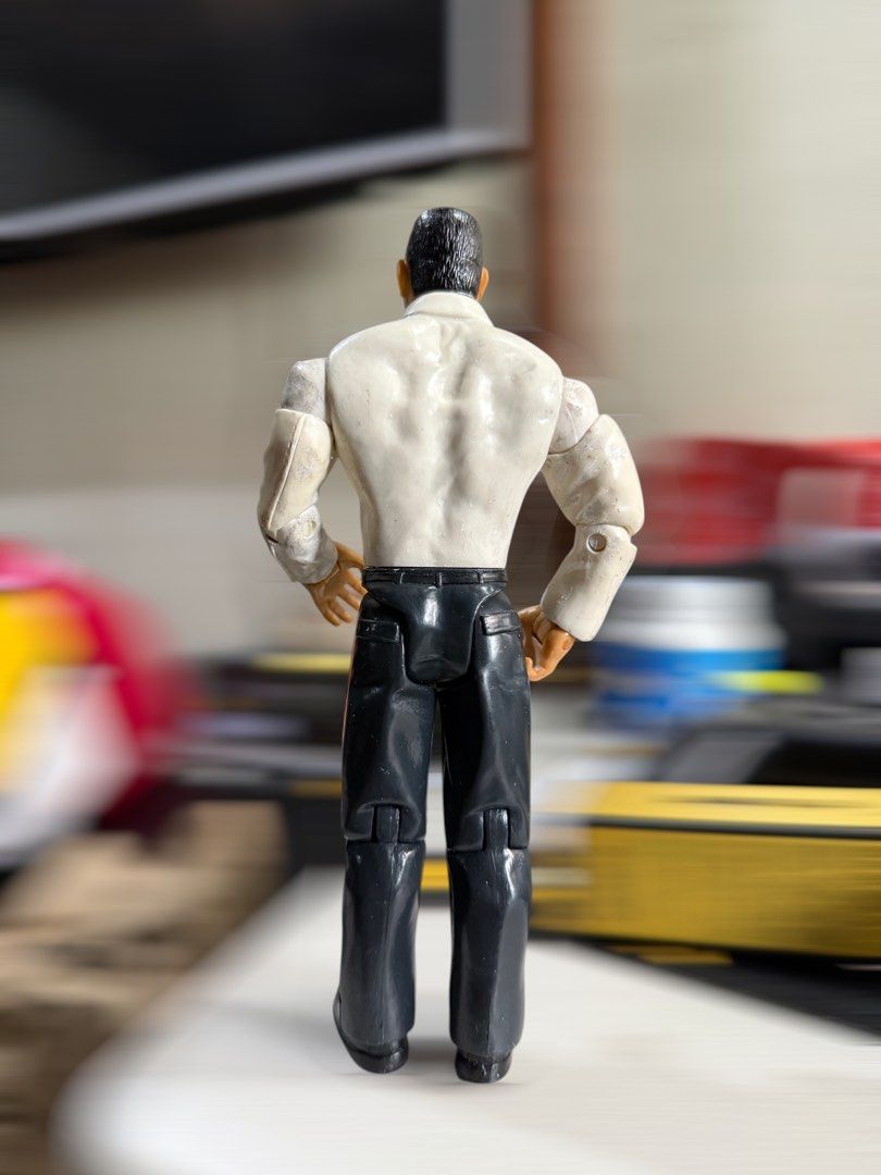 WWE Jakks Batista Figure (Category: Figurines & Statues) located in Mandaluyong City. Submitted by joshlim (Listing ID 1443806949, Image 2). Description: WWE Jakks Batista Action Figure. White shirt, black pants. Articulated joints. For collectors/display. Minor arm wear..