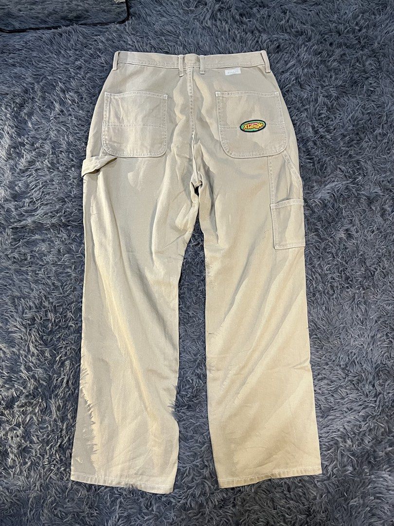 XLARGE Carpenter Pants Tan Size 32 (Category: Jeans) located in Caloocan City. Submitted by leo.noelalonzo (Listing ID 1443720502, Image 1). Description: - XLARGE Tan Carpenter Pants - Size: 32 Waist - Classic XLARGE logo patch on back pocket - Multiple utility pockets - Durable material - Ideal for everyday wear or work.