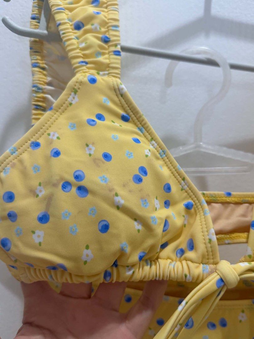 Yellow Floral Bikini Set with Ruched Straps (Category: Bikinis & Swimsuits) located in Manila. Submitted by kimquizon0629 (Listing ID 1443758611, Image 2). Description: Once used but has stain, but overall still nice. Pls manage expectation.