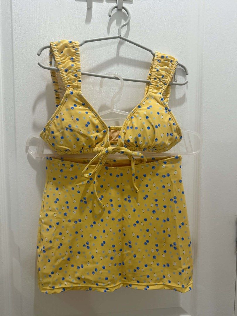 Yellow Floral Bikini Set with Ruched Straps (Category: Bikinis & Swimsuits) located in Manila. Submitted by kimquizon0629 (Listing ID 1443758611, Image 1). Description: Once used but has stain, but overall still nice. Pls manage expectation.