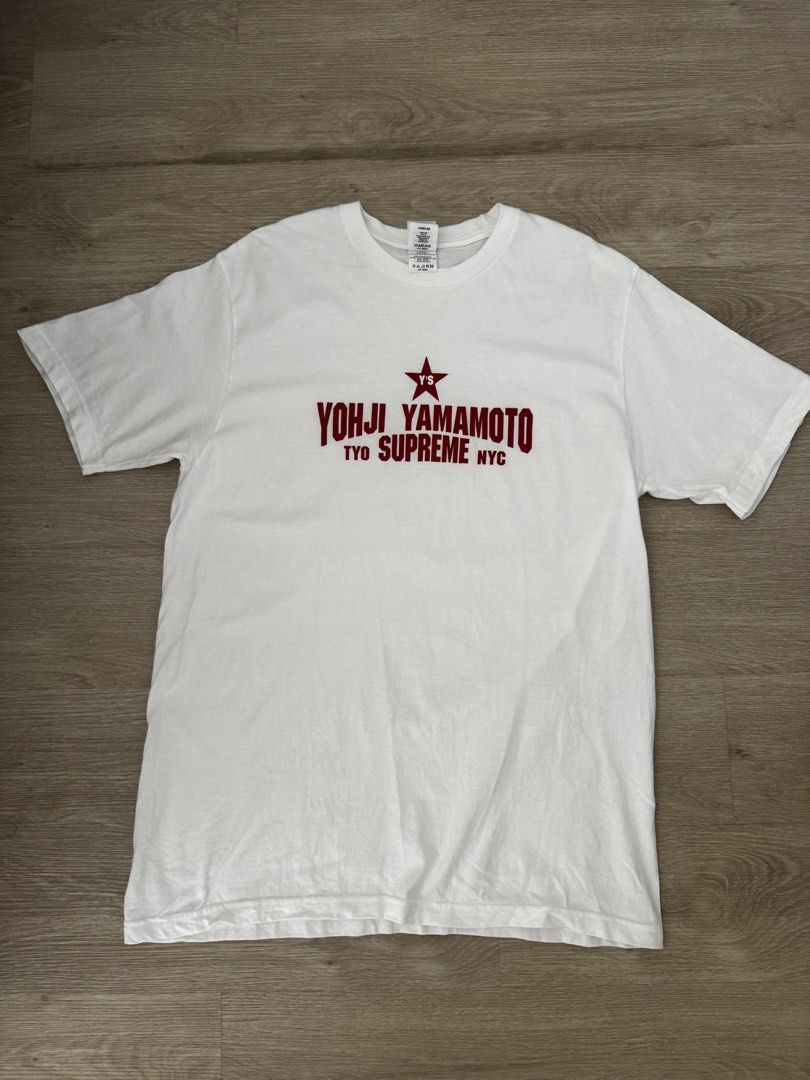 Yohji Yamamoto Tyo Supreme NYC T-shirt (Category: Tshirts & Polo Shirts) located in Singapore. Submitted by authentic100 (Listing ID 1443721710, Image 1). Description: - White t-shirt - Features Yohji Yamamoto Tyo Supreme NYC graphic print - Short sleeves - Crew neck - Size: Medium (M) - Ideal for casual wear My loss is your gain.